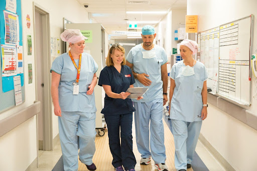 Staff working in theatres supporting permanent pacemaker procedures at Eastern Heart Clinic